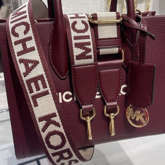 Michael Kors Mirella Small Pebbled Leather Crossbody Bag
Oxblood 
NWT - Picture 15 of 16